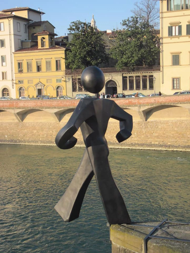 L’Uomo Comune by Clet Abraham on Ponte alle Grazie in Florence